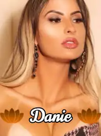 Fashion model Danie posing in stylish attire with bold makeup