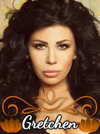 Portrait of a woman with voluminous dark hair and a serious expression