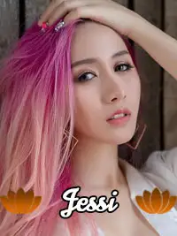 Jessi with pink hair and modern earrings