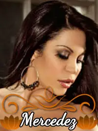 Portrait of a woman with long hair and hoop earrings