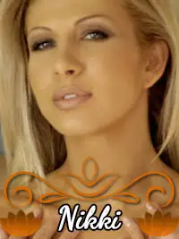 Close-up of a woman with blonde hair and makeup