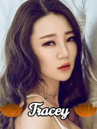 Portrait of Tracey with wavy hair and floral graphics