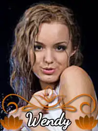 Young woman with curly hair and playful expression